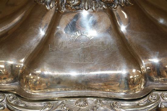 A silver plated tureen and stand width 49cm height 33cm